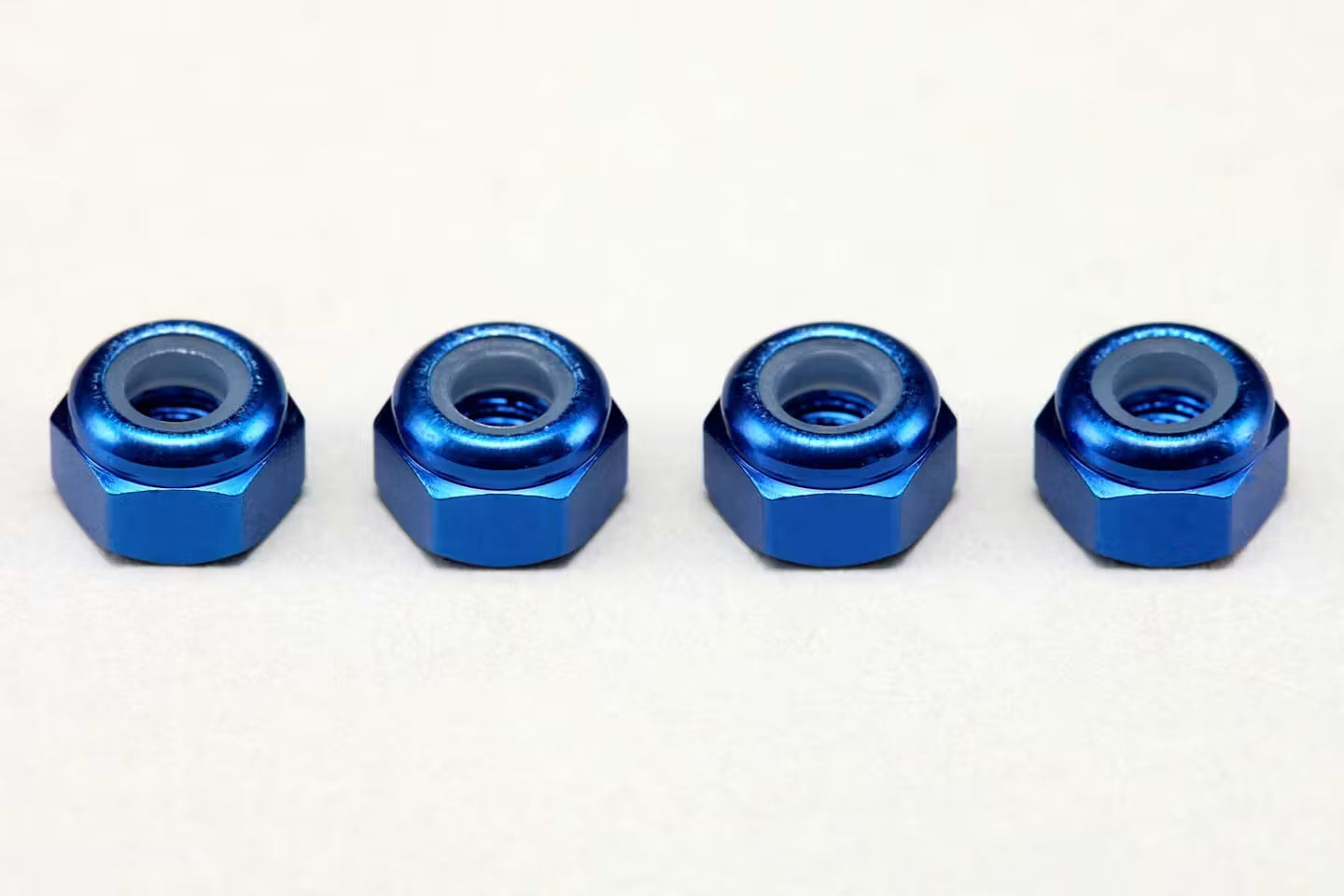 YOKOMO 3MM ALLOY NYLON LOCK NUTS - 4PCS - BLUE - ZC-N3ABL