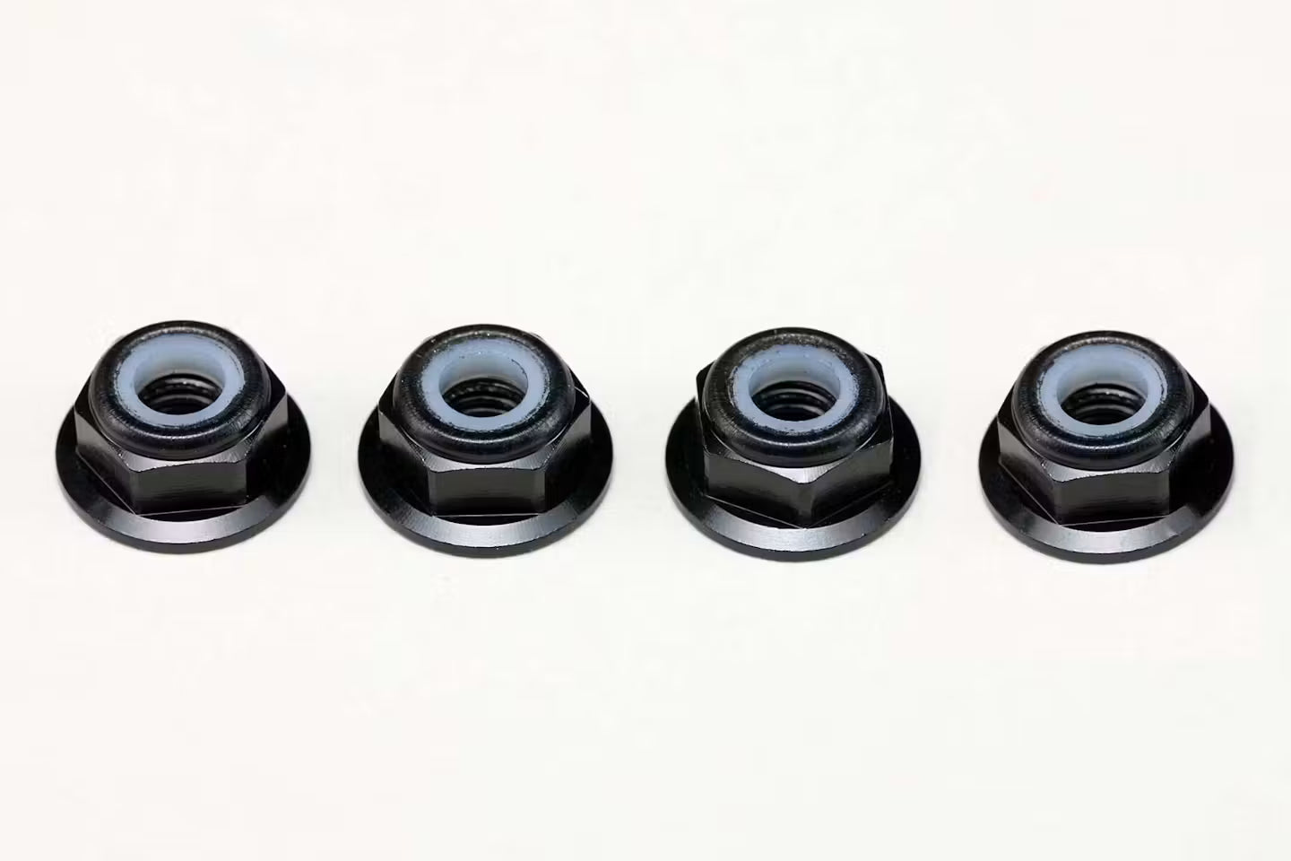 YOKOMO 4MM FLANGE ALLOY NYLON LOCK NUTS - 4PCS - BLACK - ZC-N4AFLBK